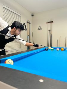 Dallas, Texas native RJ TRICKSHOT demonstrates a trick-shot pool talent that is absolutely amazing.